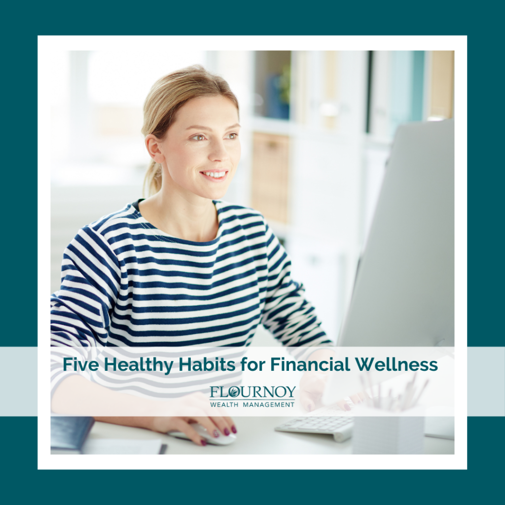 Woman working at her computer smiling